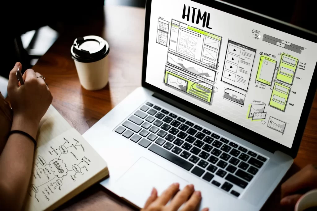 criação de sites - notebook com imagem de uma site na tela representando a importacia de uma site